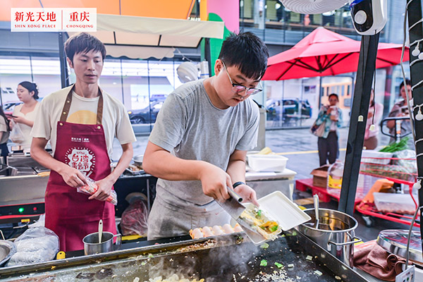 商家正在制作美食。主辦方供圖